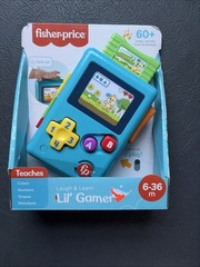 Fisher-Price Laugh & Learn Lil’ Gamer Musical Activity Learning Toy