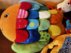 Lot (3) First Years Baby Toys – Pull Pepe Dog Mudpie Paci Cuddler Discovery Fish