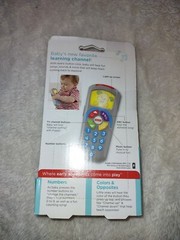 Fisher Price Laugh and Learn Puppy’s Remote 6-36 M Baby Toy 35+ Songs & Sounds.