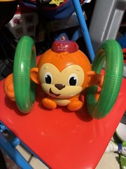 Bright Starts Monkey Jungle Light-Up Rolling Activity Toy, 6-12 Months Orange