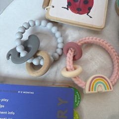 Lovevery Small Toys Lot: Books, Egg & Stand, Rattle, Photo Mat + Bonus Teethers