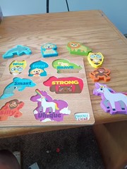 Chuckle & Roar Wooden Baby Development Toy