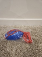 blue and red zip ball sliding toy