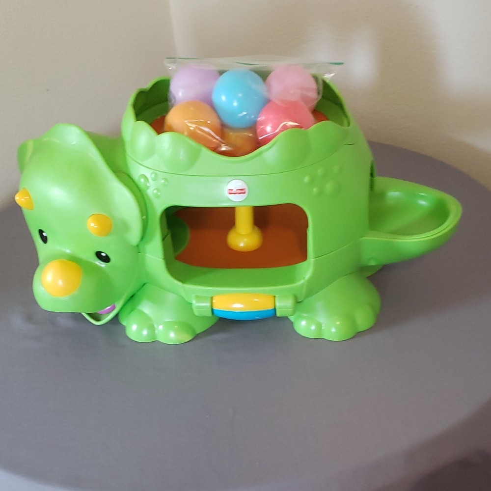 Fisher-Price Green Poppin Dinosaur Activity Toy Multicolor Hand-Eye Coordination