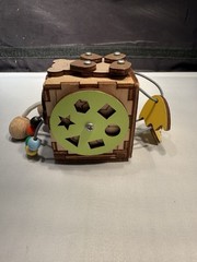 Montessori busy cube designed for toddlers fine motor skills & problem-solving
