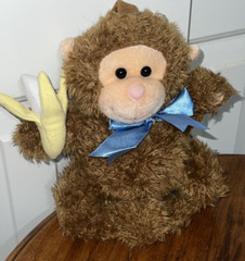 1999 Kids II Musical Monkey with Banana Plush Pull String *Works