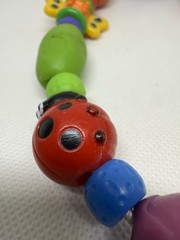 Nuby Bug- A- Loop Teether Multicolor Bee Butterfly Ladybug