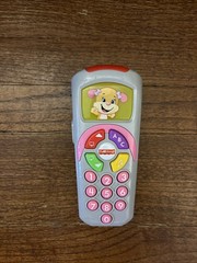 Fisher Price Laugh & Learn Puppy’s Remote TV Control with Music 6-36m Pink. C3