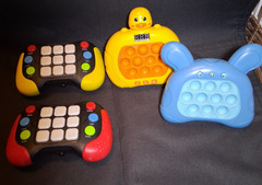 Set of 4 Fast Push Game Fidget Toys Pop Handheld Bubble Light-up NOT TESTED