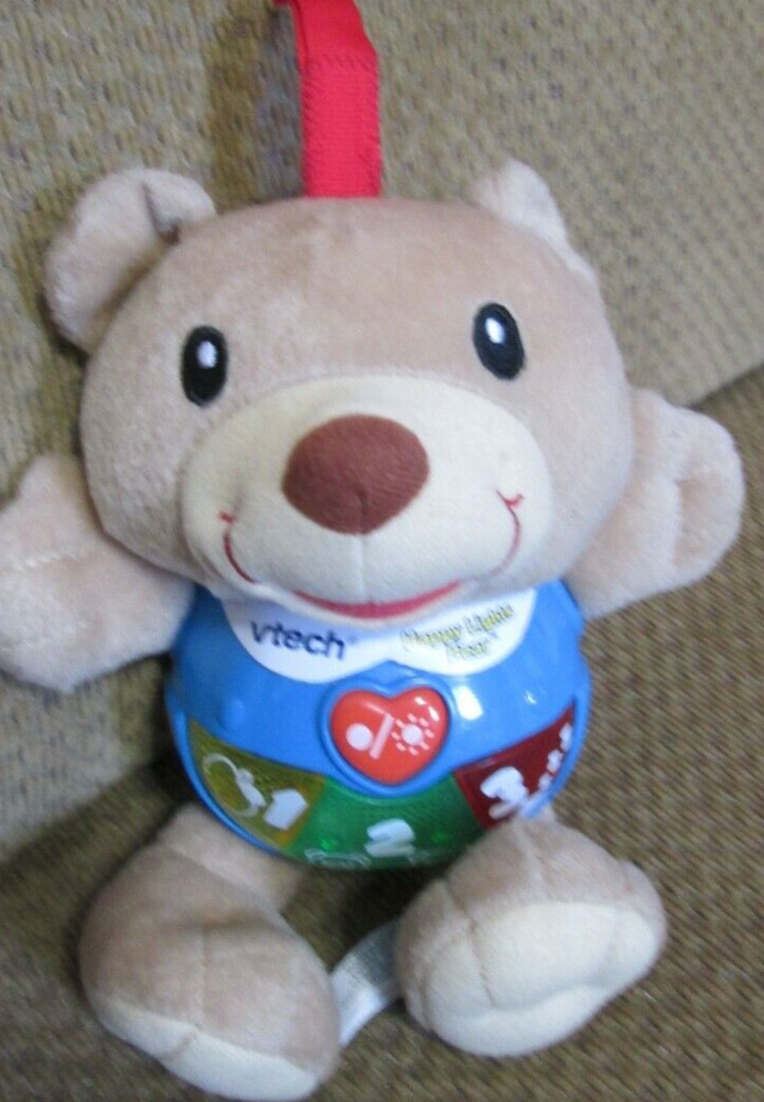 Vtech Happy Lights Bear plush talks and sings 8″
