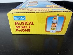 Vintage New Megcos Toddler Phone Toy Musical Learning Mirror Talking Numbers