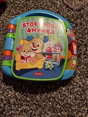 Fisher-Price Laugh and Learn Storybook Rhymes Book with Lights & Sounds