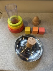 Lovevery Explorer Play Kit 9-10mo Blocks, Tube W/ Rings, Egg Cup, Tip & Turn