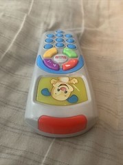 Fisher Price Laugh and Learn Puppy’s Remote Baby Toy 35+ Songs & Sounds 6-36 M