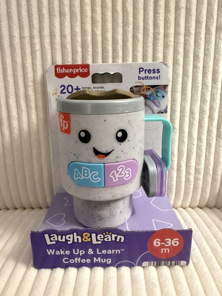 Fisher-Price Musical Coffee Mug Toy with Lights Sounds Songs Rattle NIB 6-36M