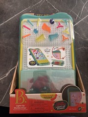 B. Toys Light-Up Marble Drop Illuminated Pegboard Multicolor 180 Pieces