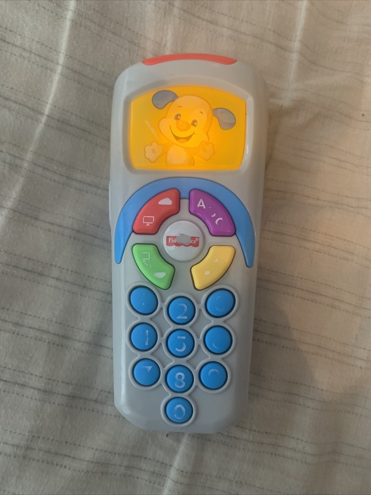 Fisher Price Laugh and Learn Puppy’s Remote Baby Toy 35+ Songs & Sounds 6-36 M