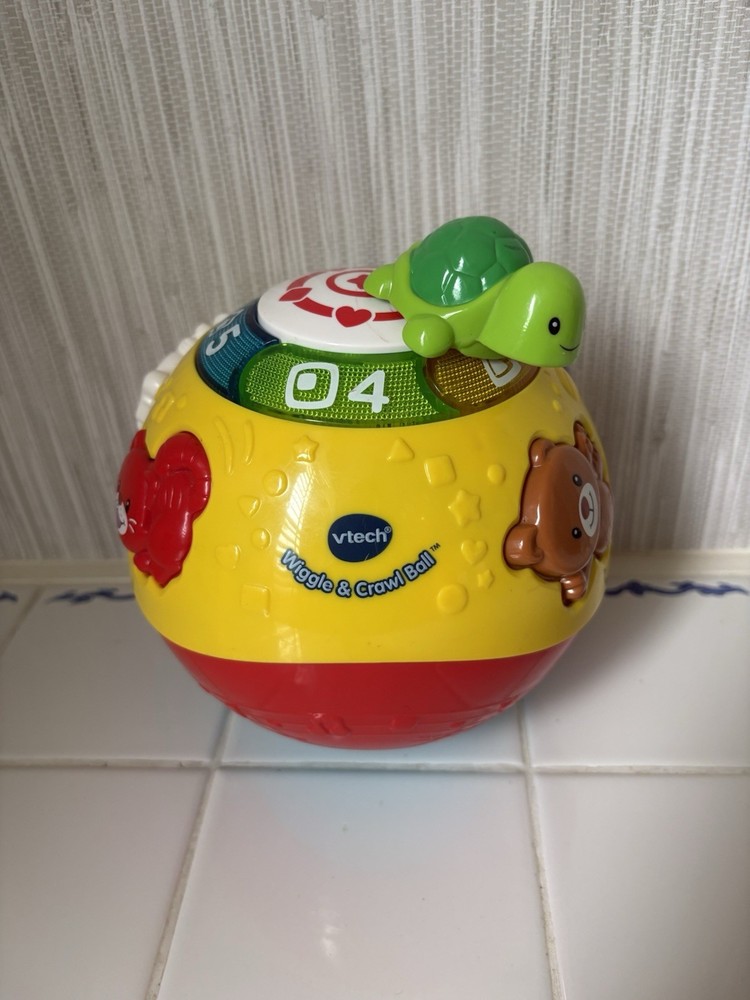 V-Tech Wiggle and Crawl Ball Educational Toy for Babies 6-36 Months Works Great