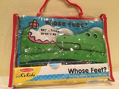 MELISSA & DOUG, WHOSE FEET? SQUEAKING, CRINKLING CLOTH BOOK, MACHINE WASH, NIP