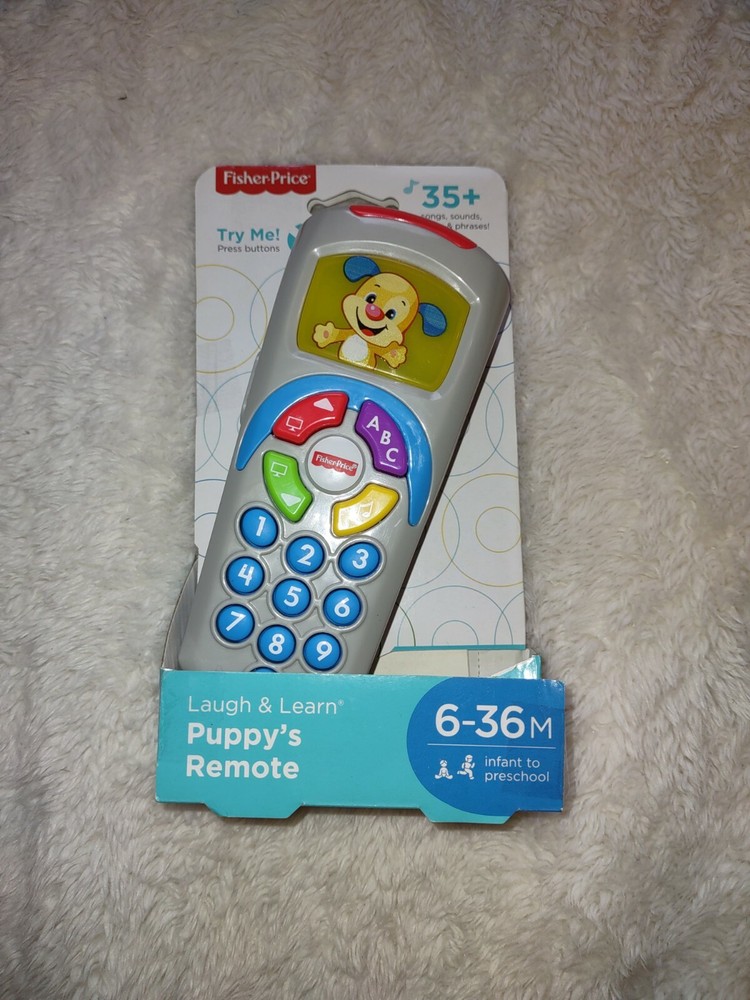 Fisher Price Laugh and Learn Puppy’s Remote 6-36 M Baby Toy 35+ Songs & Sounds.