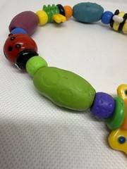 Nuby Bug- A- Loop Teether Multicolor Bee Butterfly Ladybug