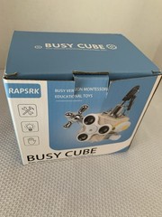 Busy cube designed for toddlers fine motor skills & problem-solving