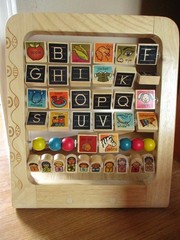 B Toys Wooden Abacus Alphabet Letters and Numbers Spinning Blocks learning Toy