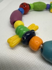 Nuby Bug- A- Loop Teether Multicolor Bee Butterfly Ladybug