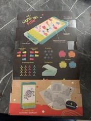 B. Toys Light-Up Marble Drop Illuminated Pegboard Multicolor 180 Pieces