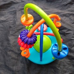 Kids II Activity Toy Sensory Play Baby Toddler Blue Green Orange Red Rings 9″