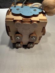 Montessori busy cube designed for toddlers fine motor skills & problem-solving