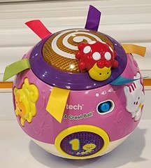 V-Tech-Move & Crawl Ball-Talks-Lights-Music-Colors-Shapes-Rolls w/Ribbon Grabs
