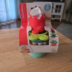Infantile Stack Of Fun. Recommend for 9+ Months. Can Be Used to Stack or Bath.