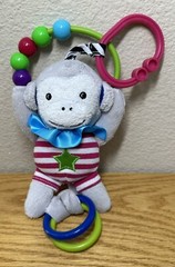 The Manhattan Toy Company – Monkey Travel Activity Toy – Clip On Design – 13″