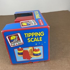 New Peek-A-Babe Tipping Scale Wood Stacking Rings Balance Toy Primary Colors